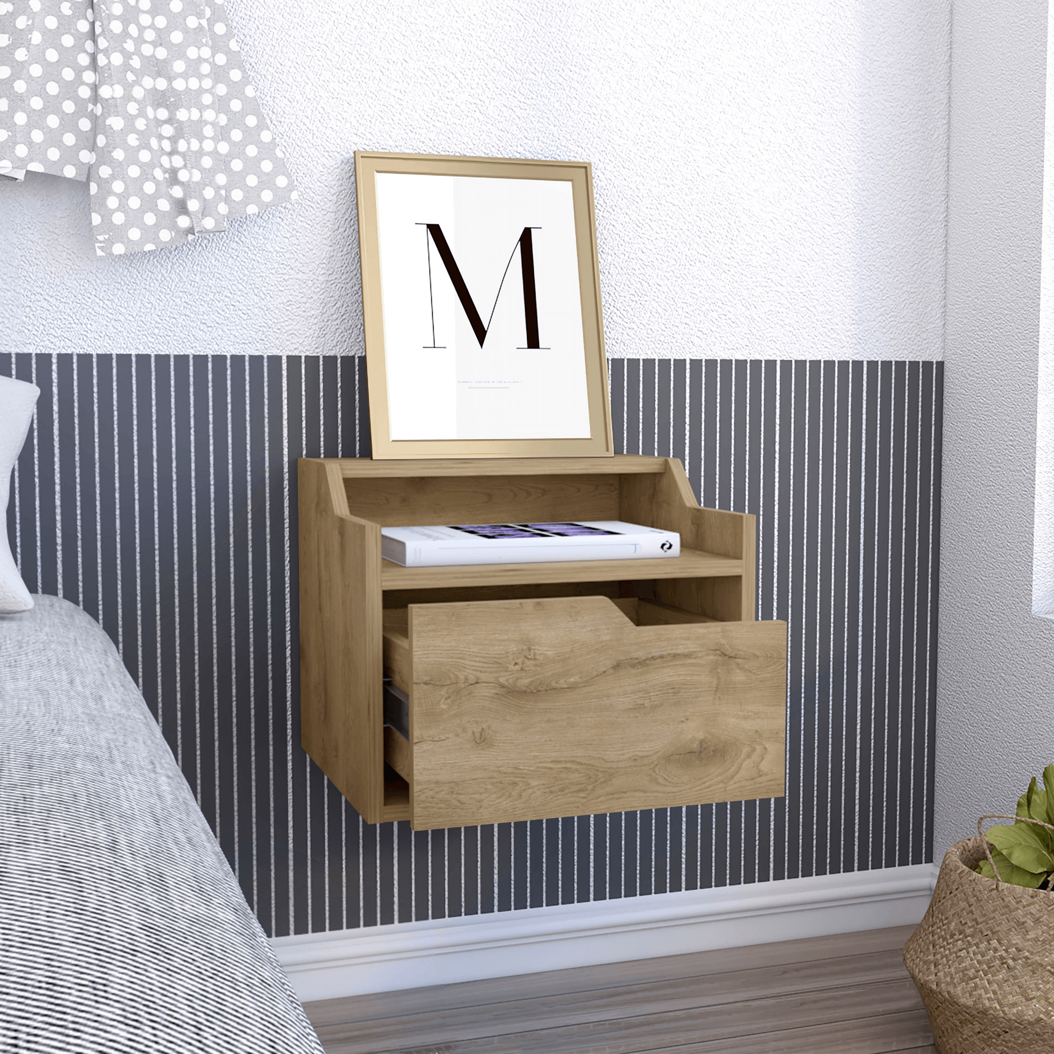 Wooden wall-mounted nightstand with a drawer and framed picture in a bedroom setting.