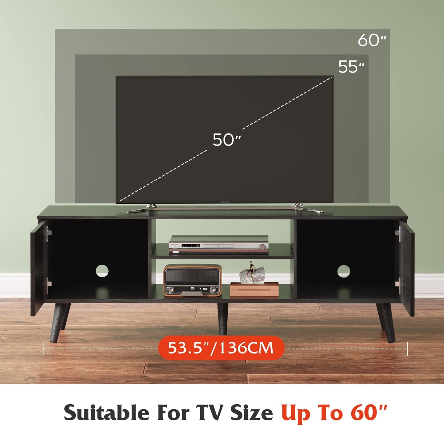 Black TV stand with measurements for TV size compatibility against a green wall.