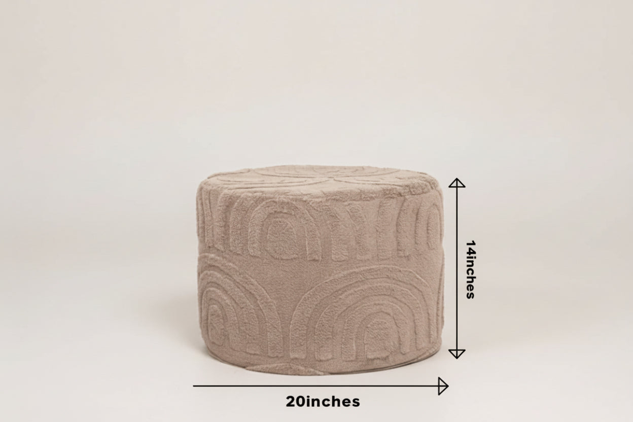 Beige ottoman with measurements in a living room setting, featuring icons for perfect size, no need to assemble, and sturdiness.