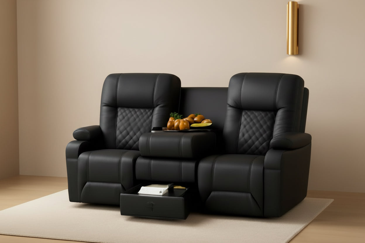 Black leather recliner chairs in a living room setting with a tray of snacks on a small table.