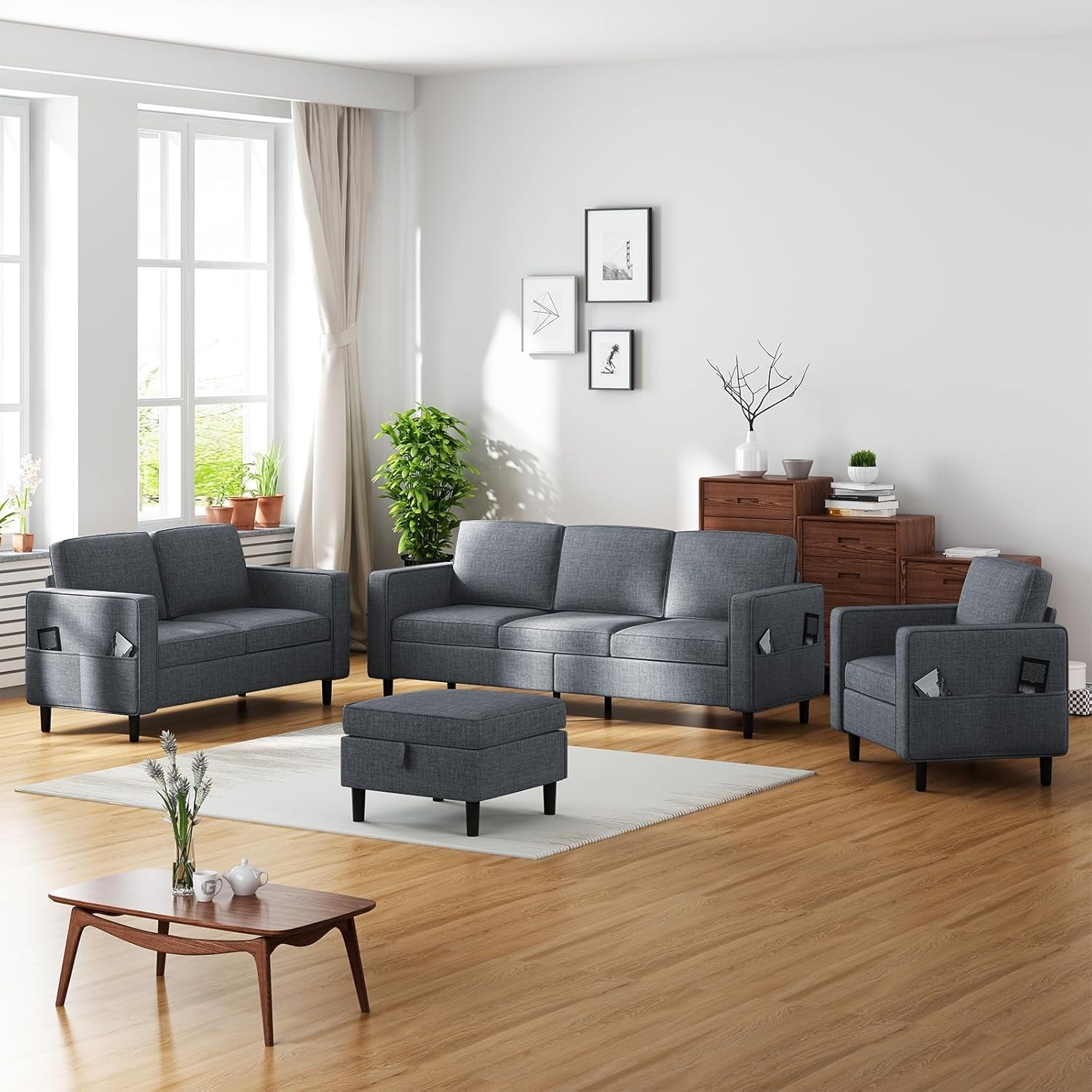 Modern living room with gray sofa set and wooden coffee table.