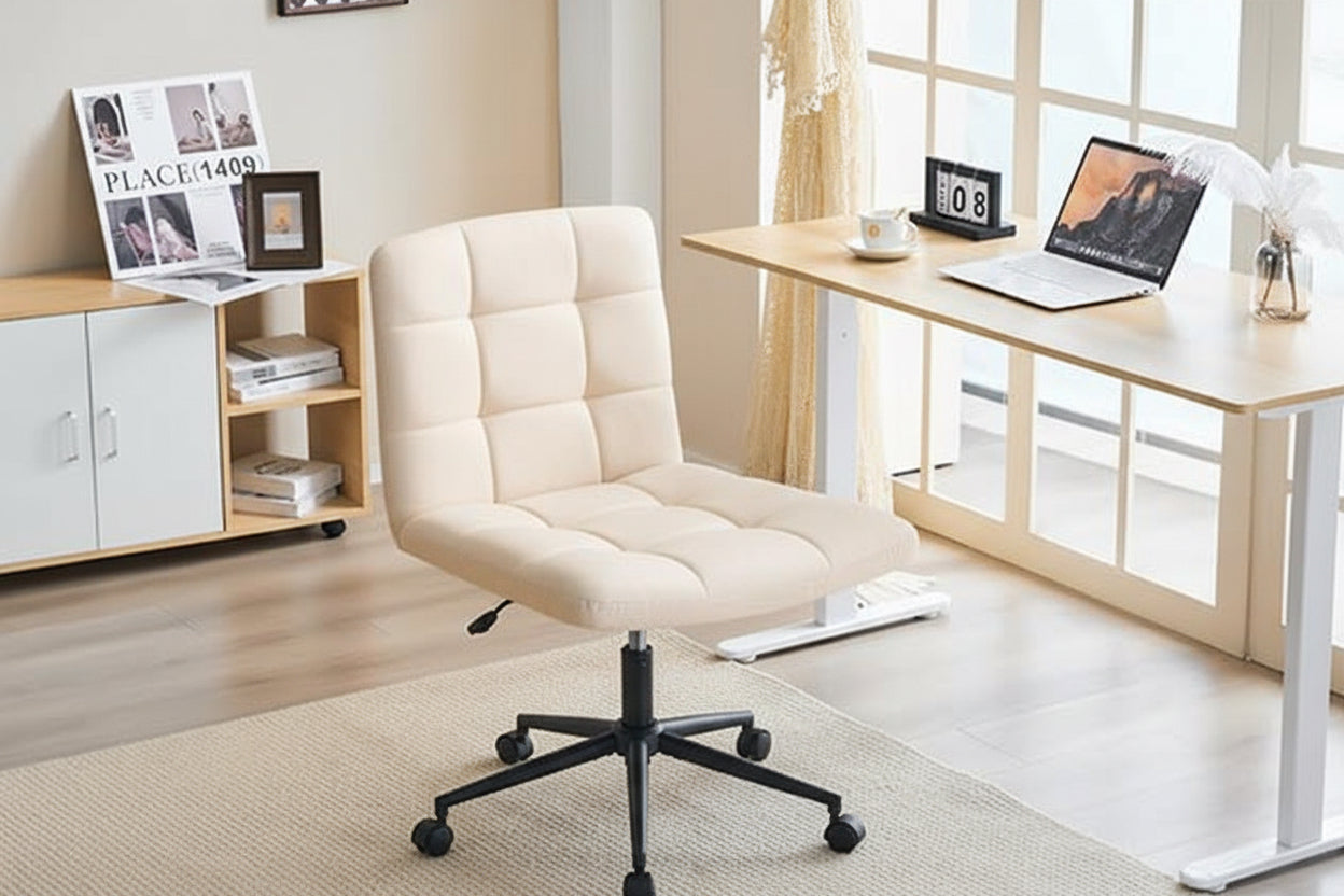Woman and child reading a book on a beige office chair in a home office setting.