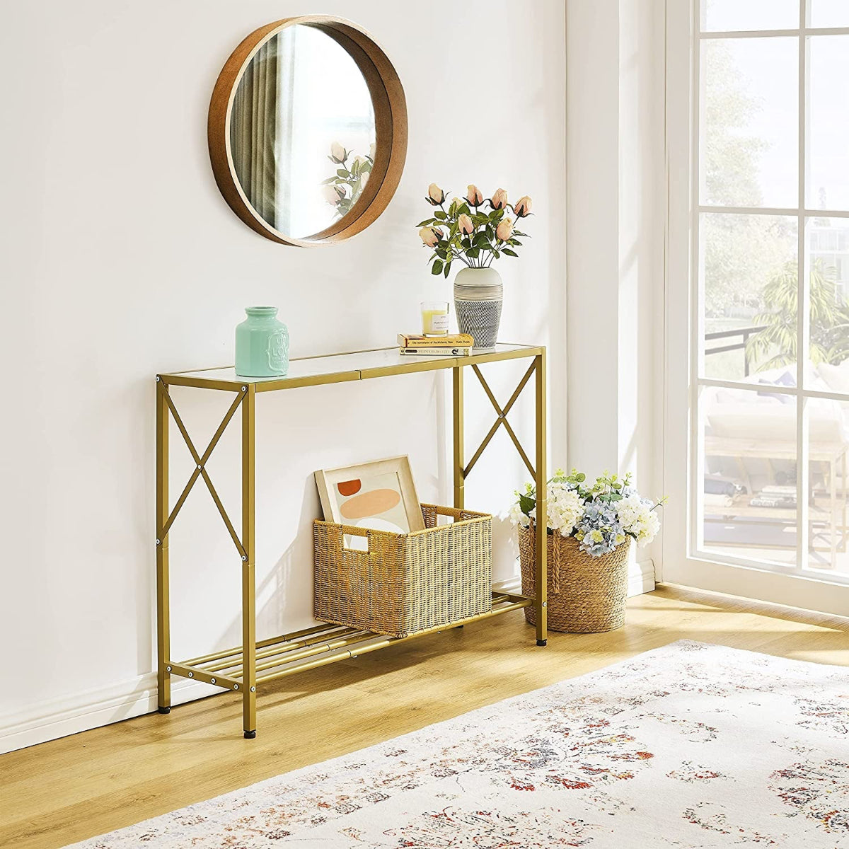 Gold console table with decorative items in a bright room