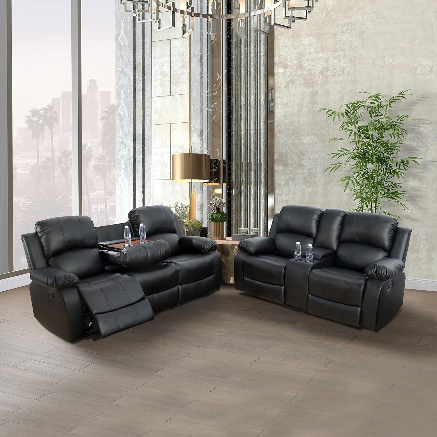 Black leather recliner sofa set in a modern living room with large windows and decor.