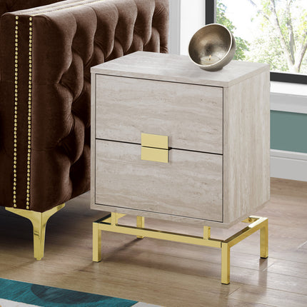 Beige nightstand with gold accents next to a brown upholstered chair in a room with a window.