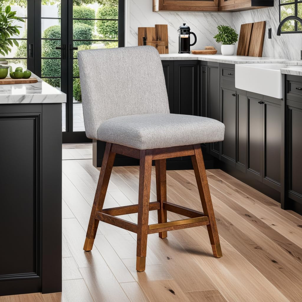 Gray cushioned bar stool with wooden legs in a kitchen setting