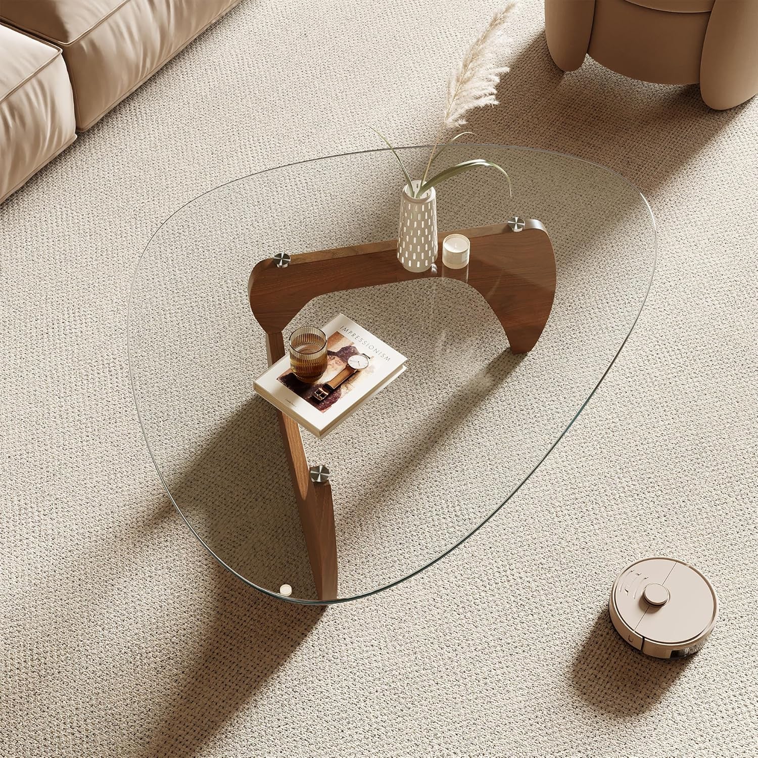 Glass coffee table with wooden side table in a living room setting