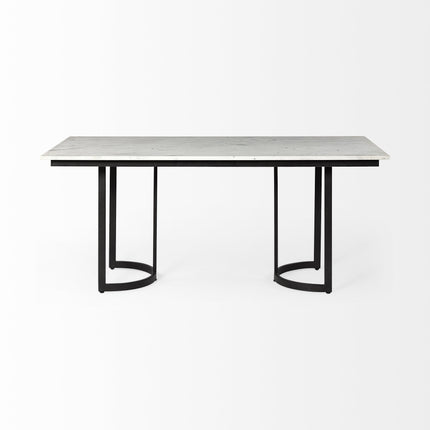 Dining table with marble top and black metal frame on a white background
