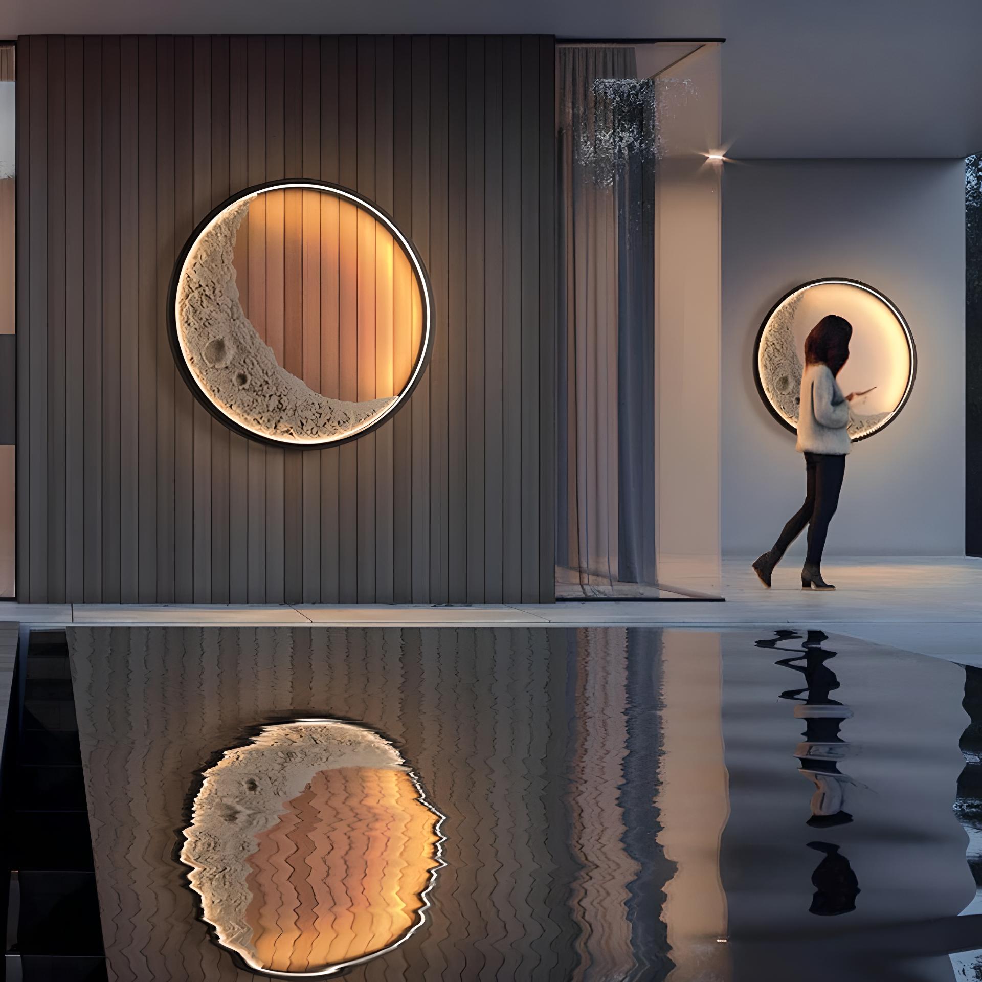 Modern interior design with circular wall lights resembling moons.