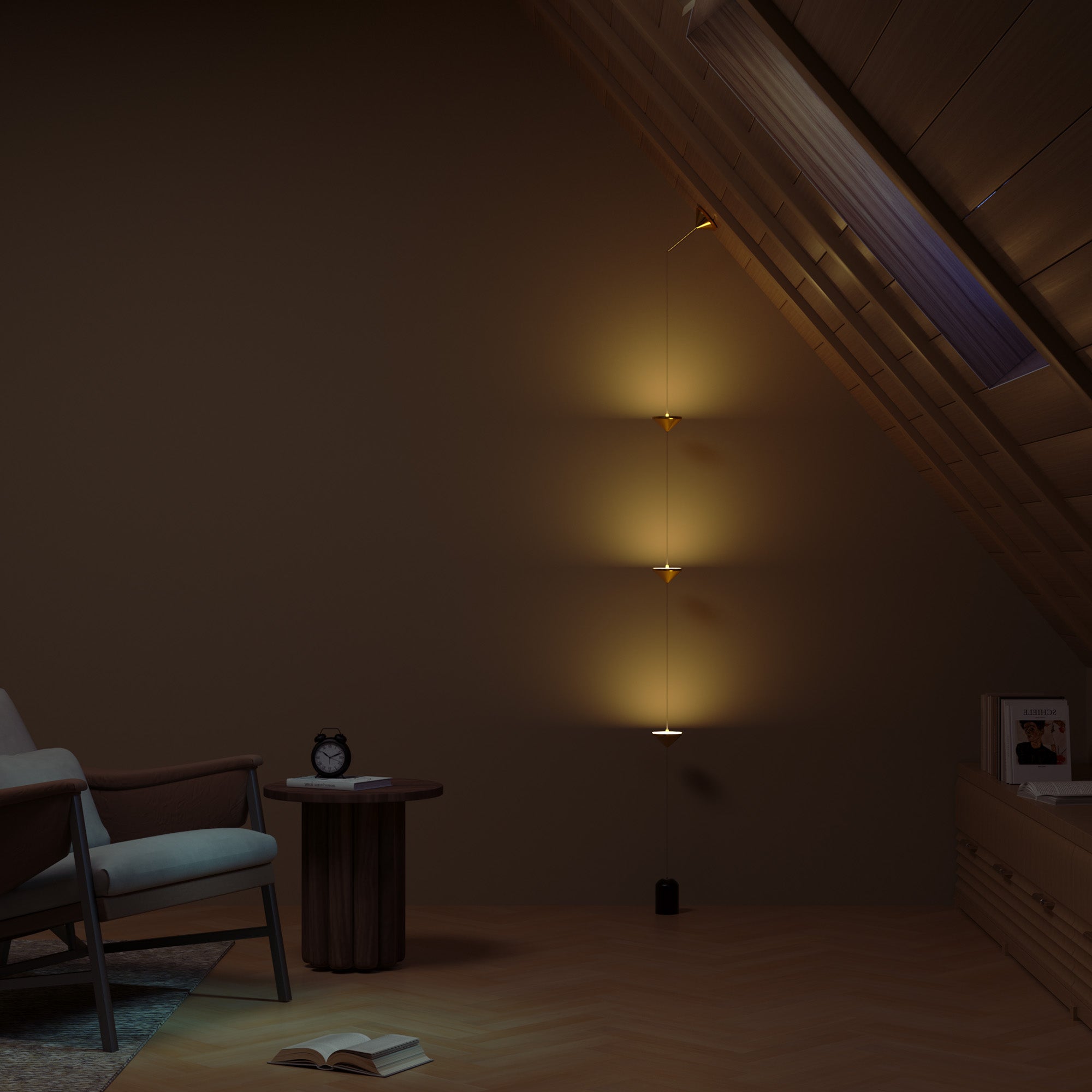 Dark room with a small table, chair, and open book illuminated by a hanging light fixture.