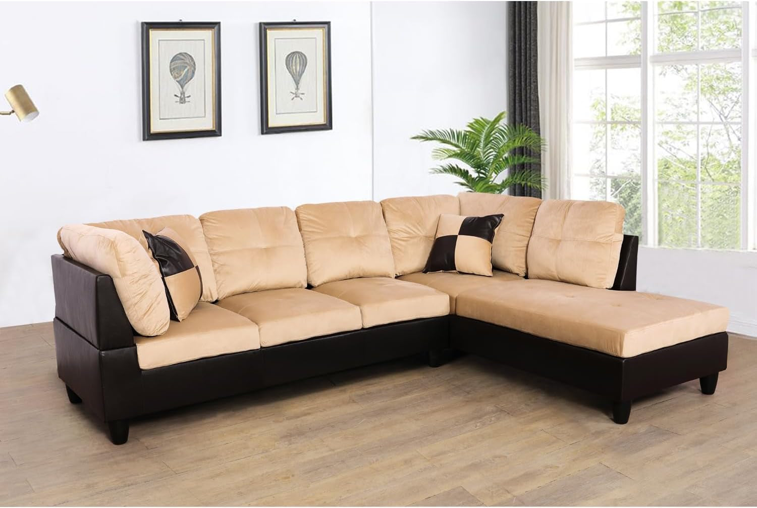 Beige sectional sofa with brown accents in a living room setting.