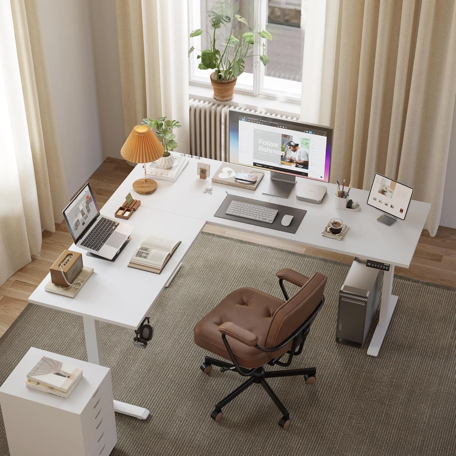 Modern home office with a white desk, chair, and computer setup.