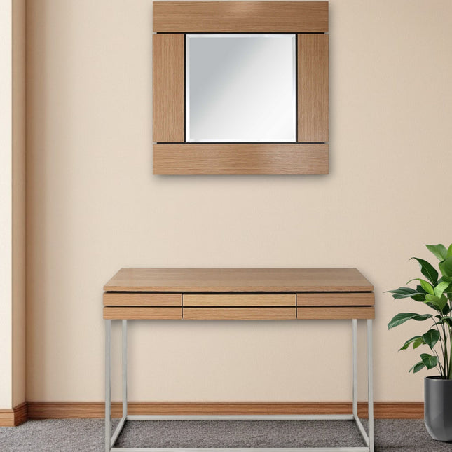 Wooden console table with mirror above it against a beige wall.