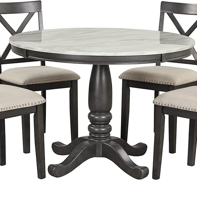 Round dining table with four matching chairs on a white background