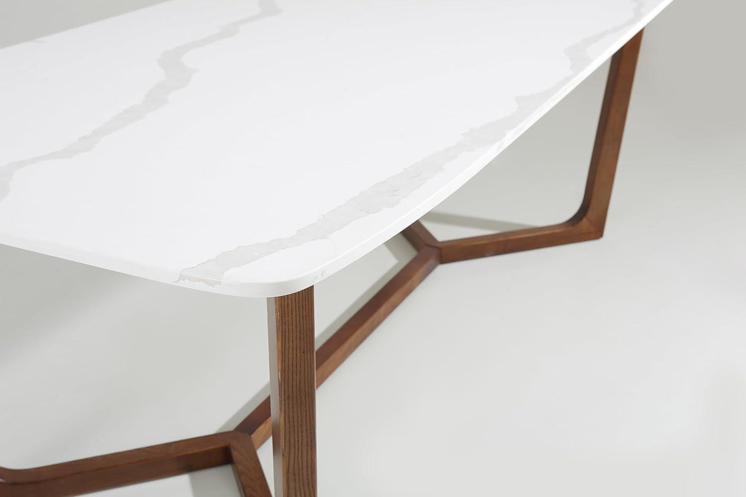 White table with wooden legs on a light gray background