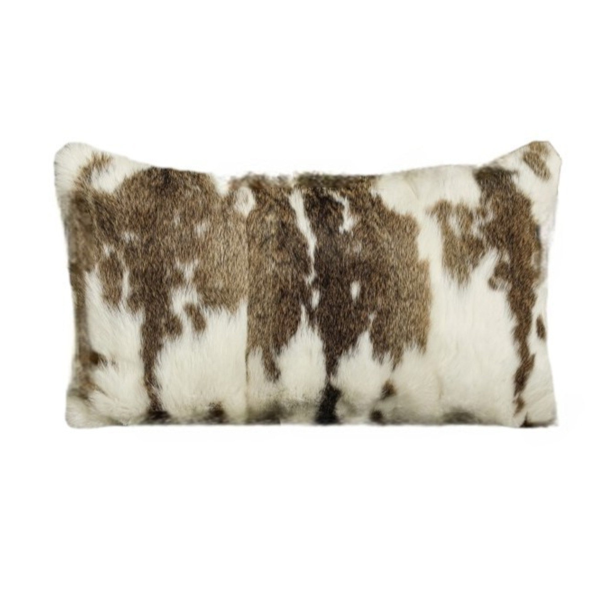 Decorative pillow with brown and white cow print pattern on a white background