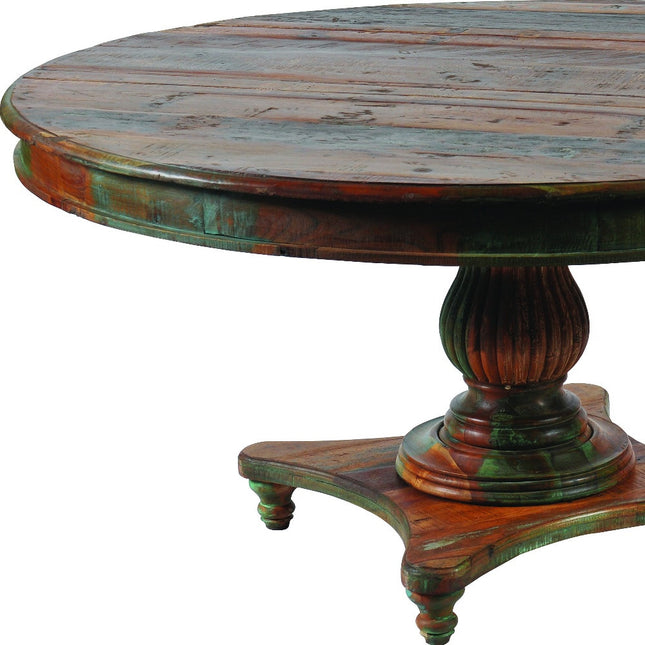 Round wooden table with a distressed finish on a white background