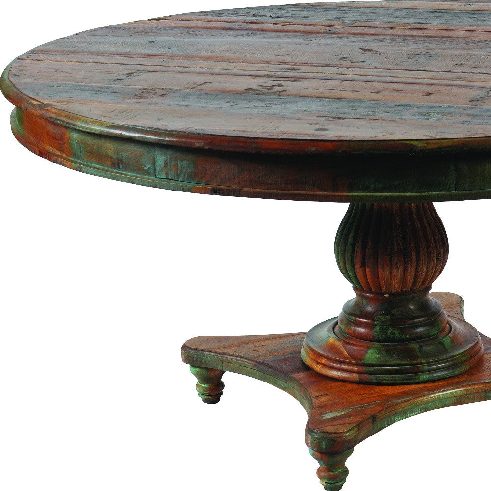 Round wooden table with a distressed finish on a white background