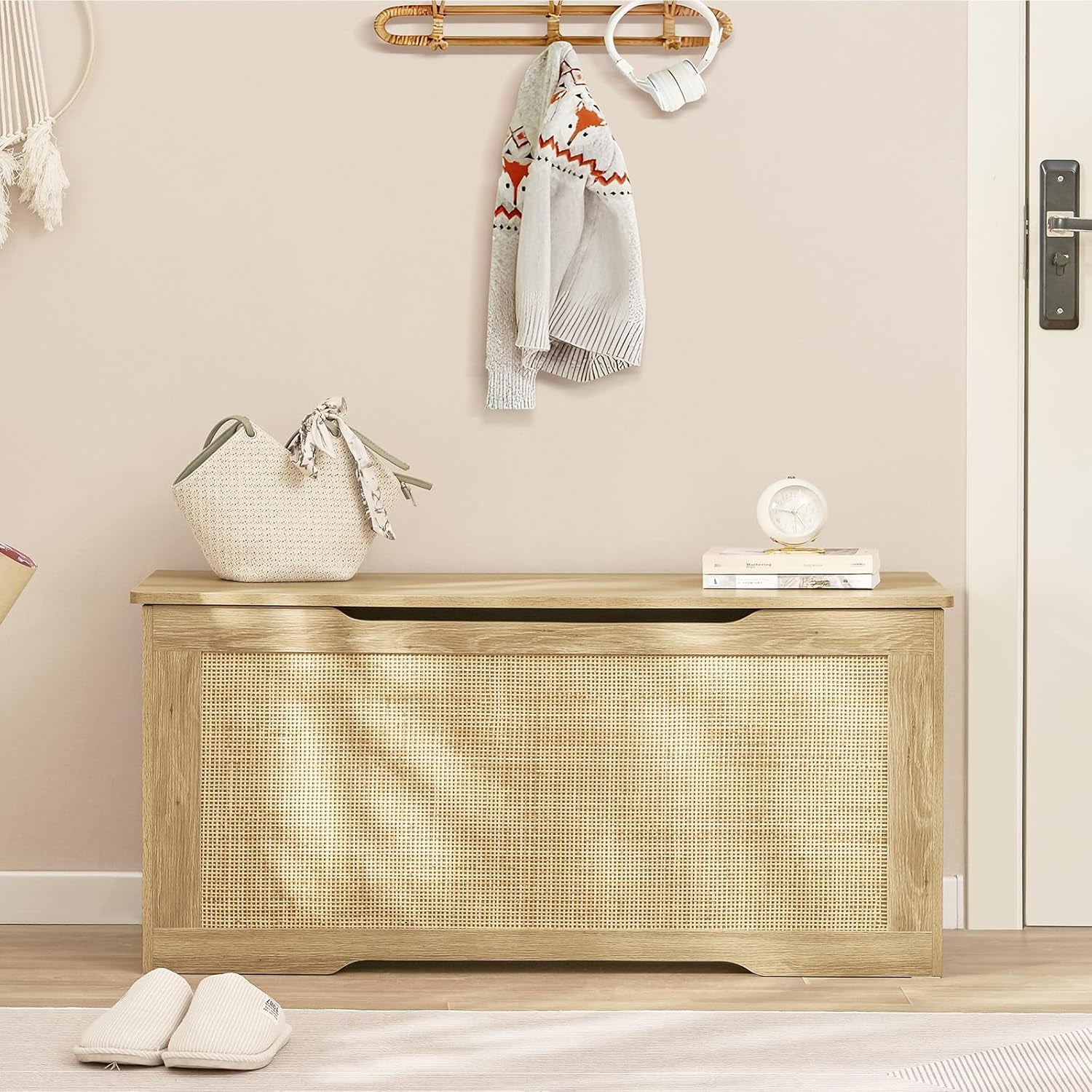 Wooden storage bench with woven design in a room setting.