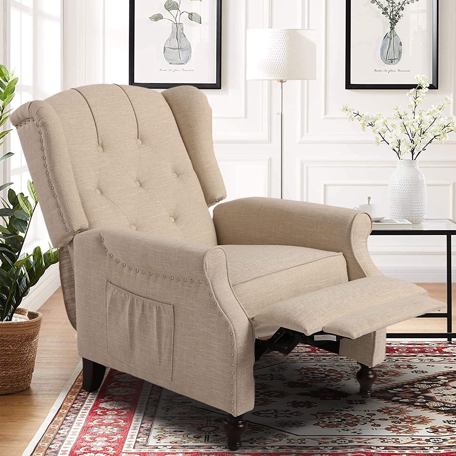 Beige recliner chair in a living room setting with decor elements.