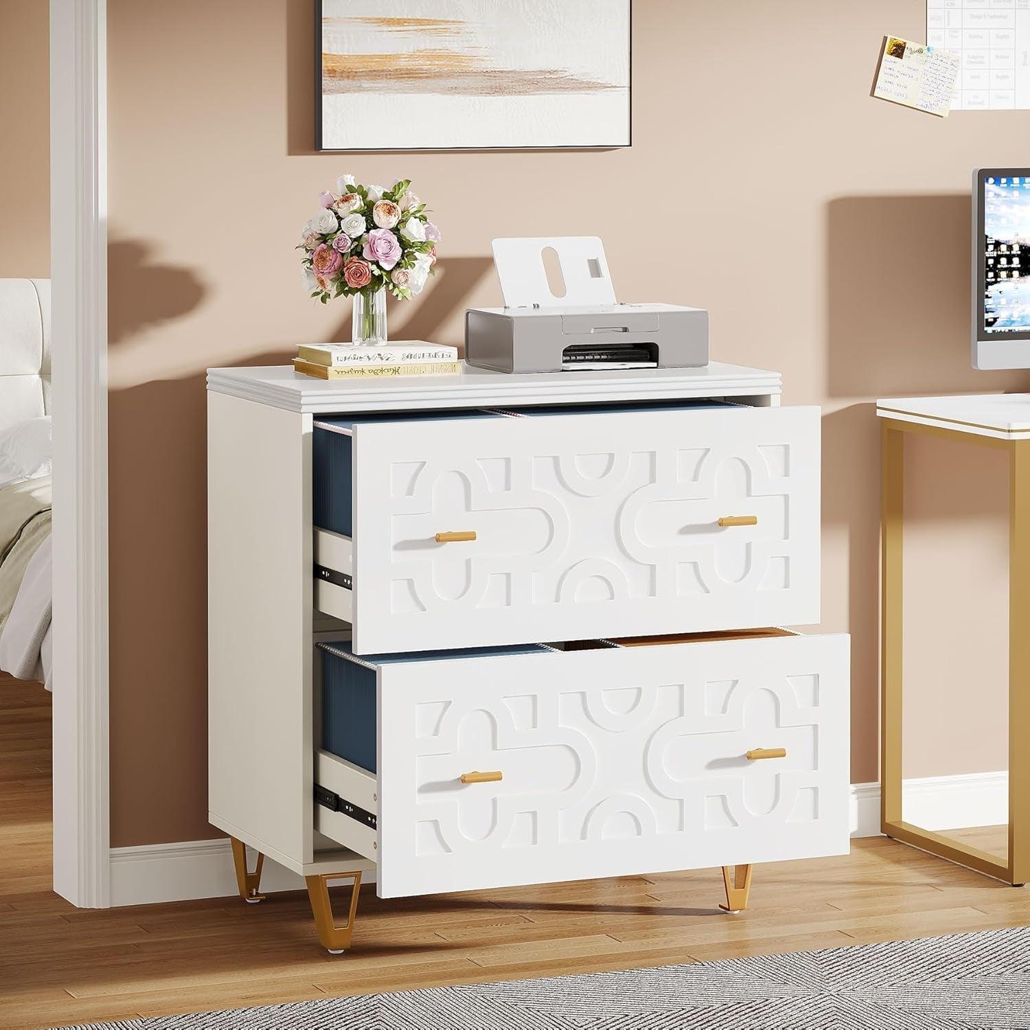 White nightstand with geometric design in a bedroom setting