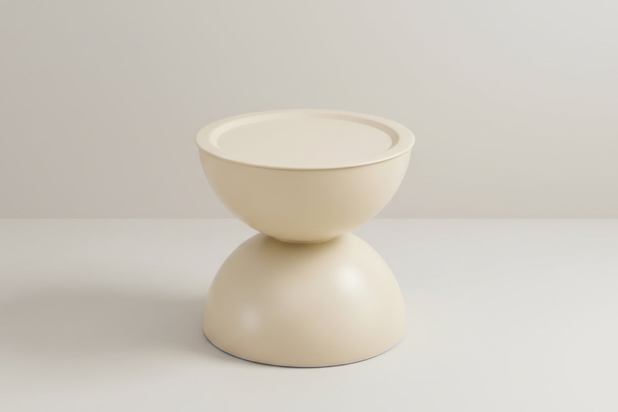 Beige side table with two spherical shapes on a white background