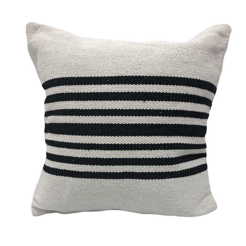 Striped pillow with black and white stripes on a plain background