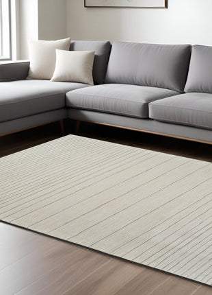 8' X 11' Cream and Beige Abstract Non Skid Area Rug-0