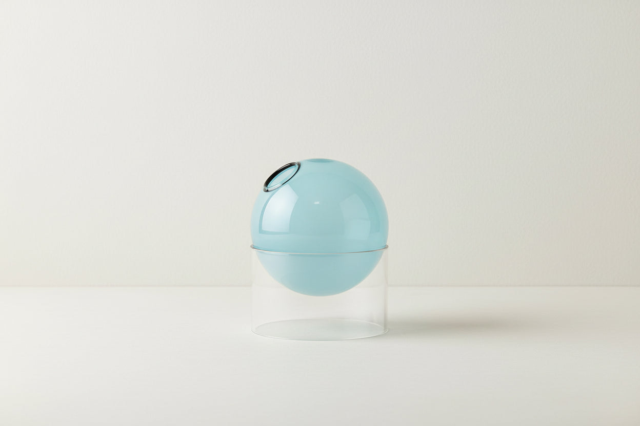 Light blue spherical object with dimensions labeled on a white background