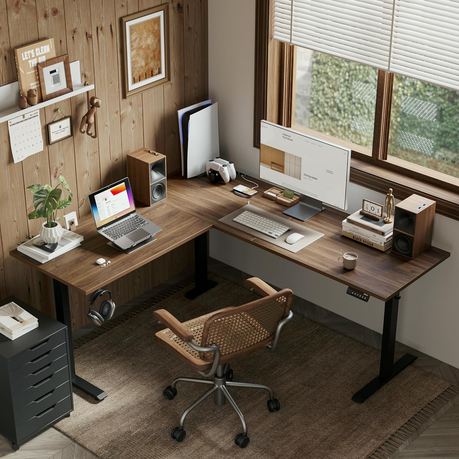 Modern home office with a wooden L-shaped desk, chair, and computer setup.
