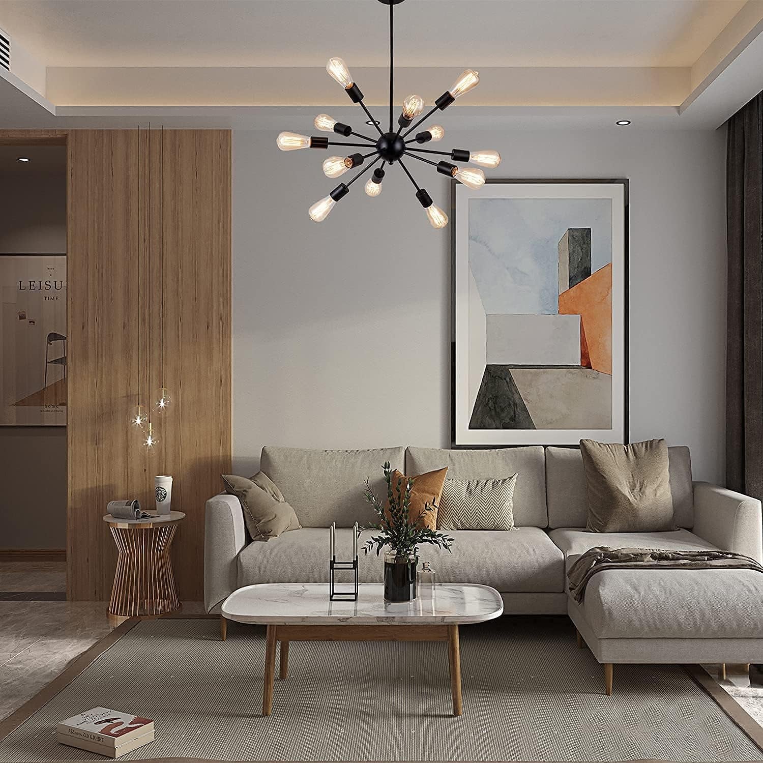 Modern living room with a gray sofa, coffee table, and decorative elements.