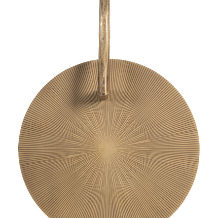 Gold circular pendant with textured design on a white background