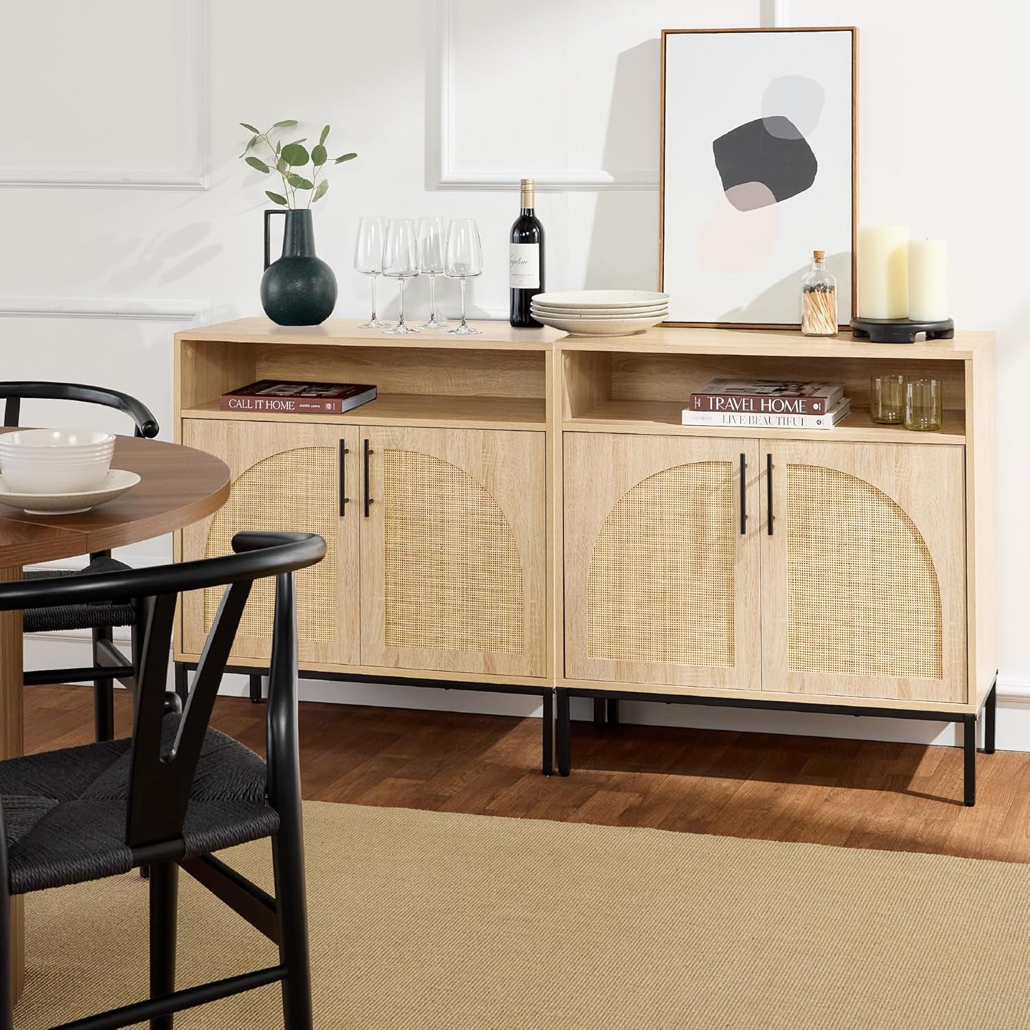 Wooden sideboard with wicker doors in a dining room setting.