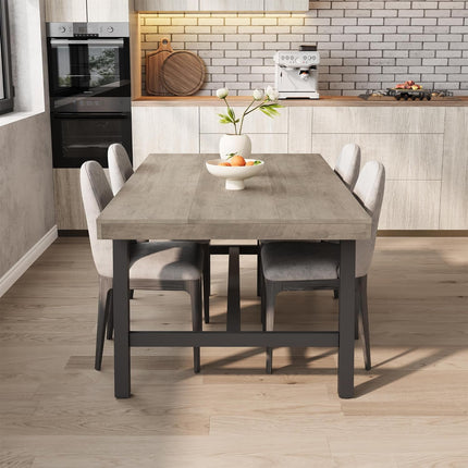 Dining table with chairs in a modern kitchen setting