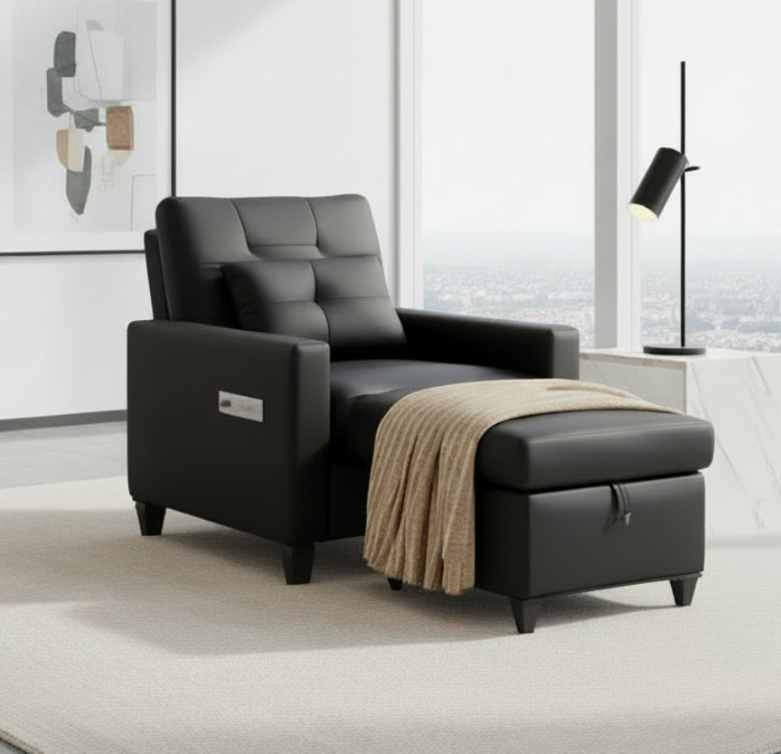 Black recliner chair with a beige blanket in a cozy room setting.
