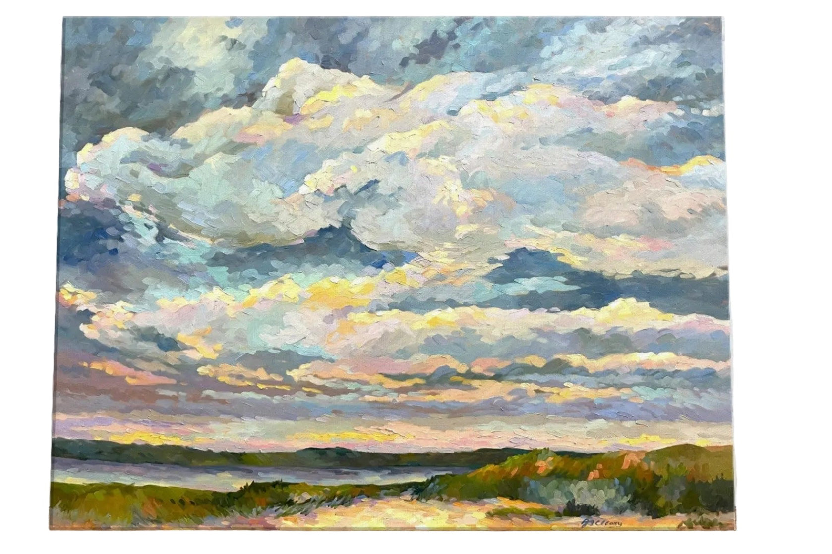 Painting of a landscape with clouds on a wall.