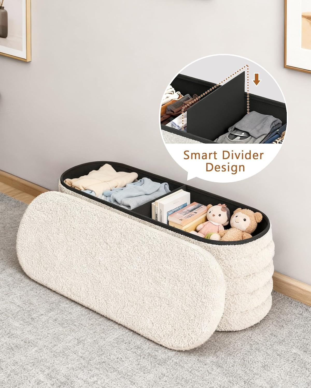 White ottoman with black storage compartment containing clothes and toys, against a neutral wall.