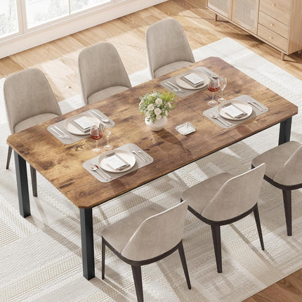 Dining table set with chairs in a well-lit room