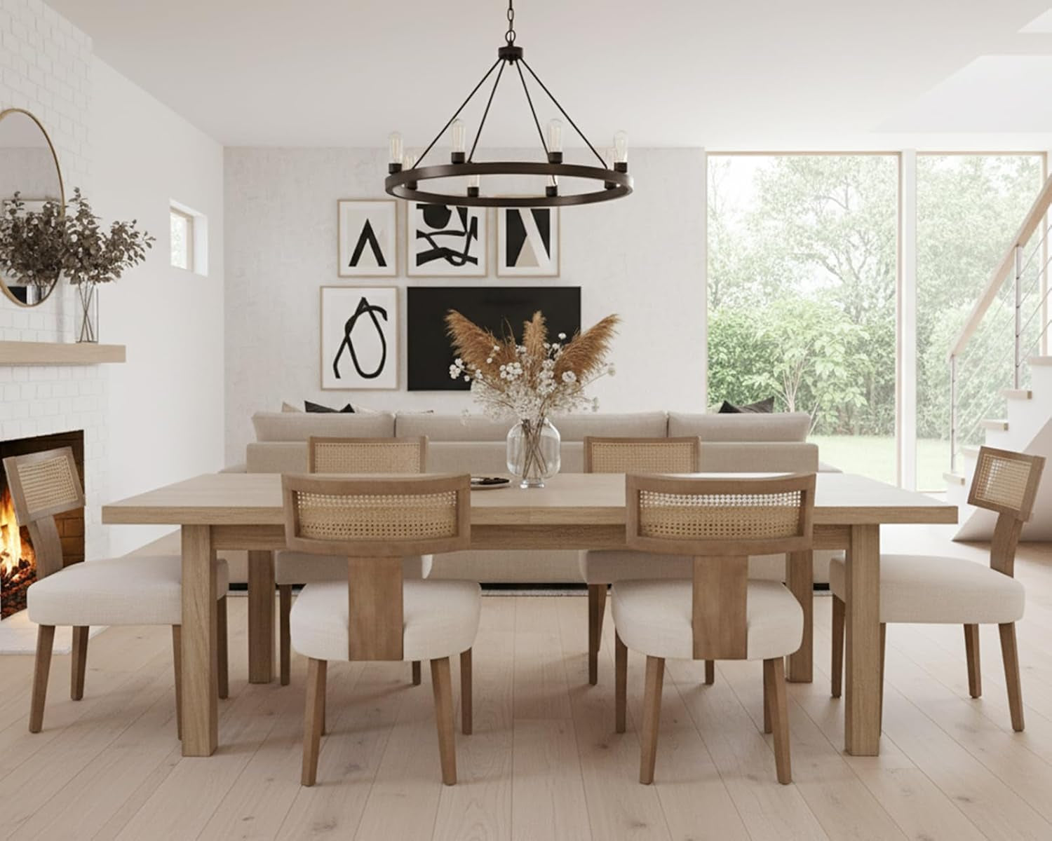 Dining room with wooden table and chairs, fireplace, and large windows.