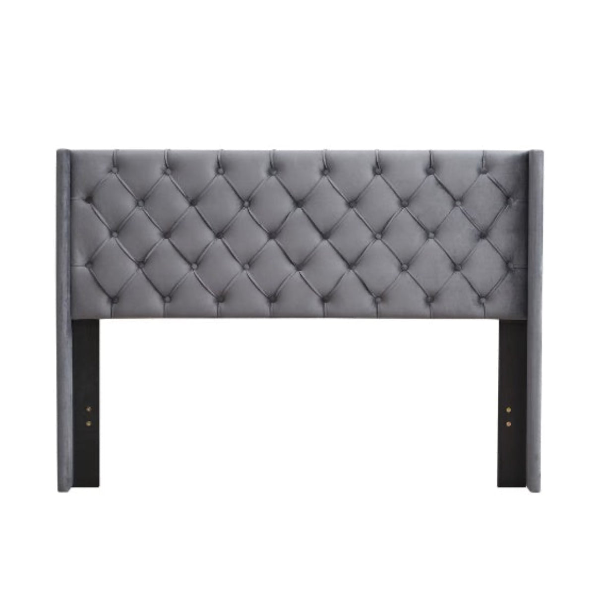 Gray tufted headboard on a white background