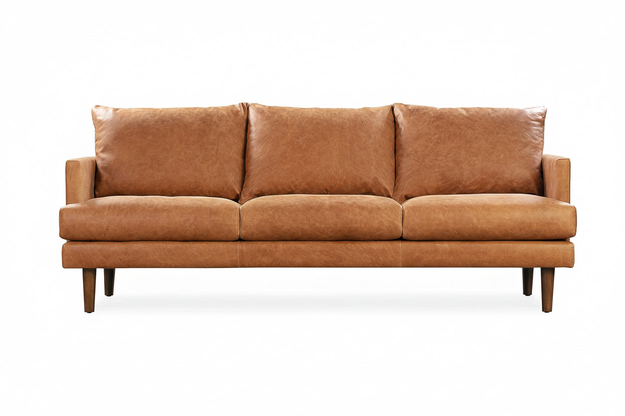 Brown leather sofa on a white background