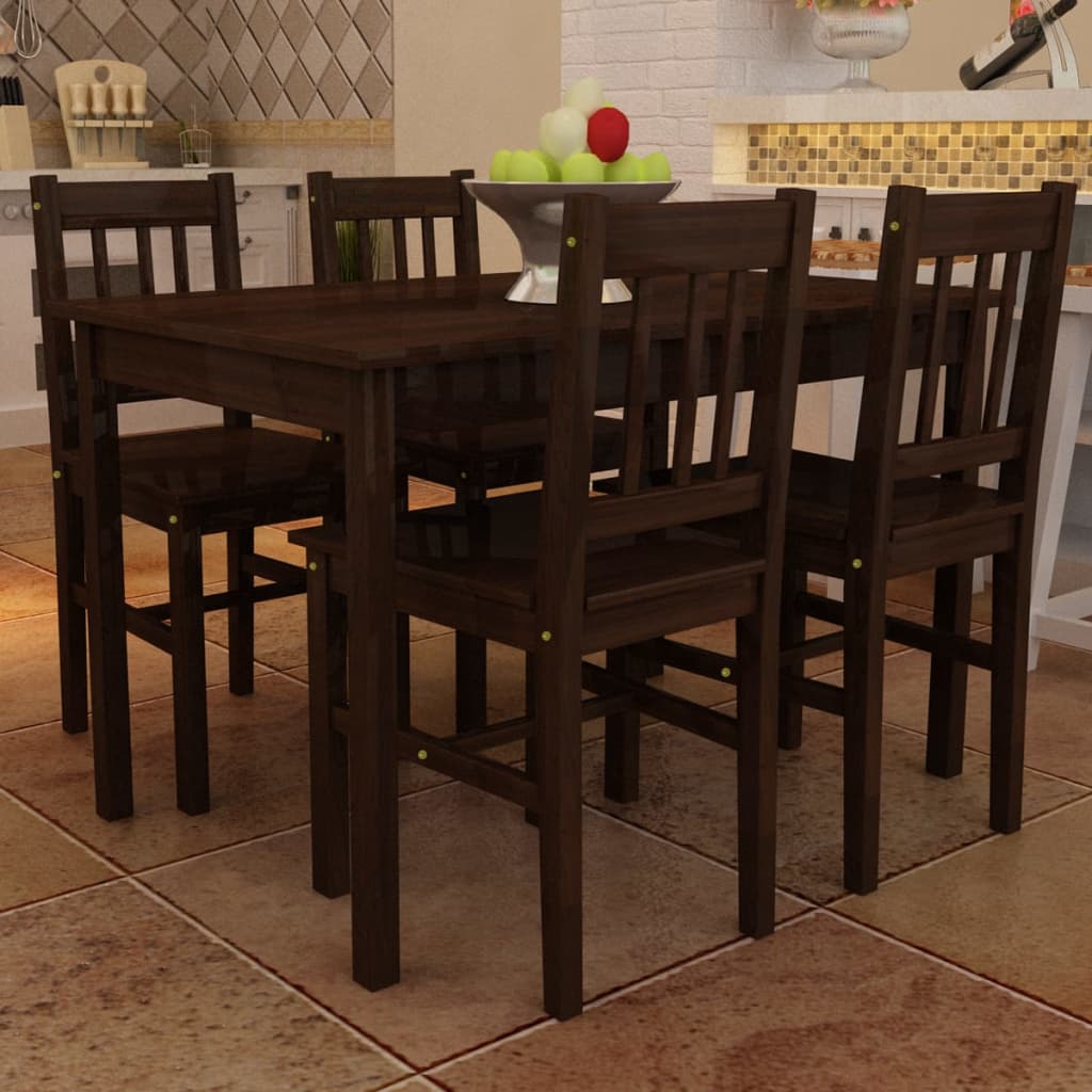 Dark wooden dining table with four matching chairs in a kitchen setting.