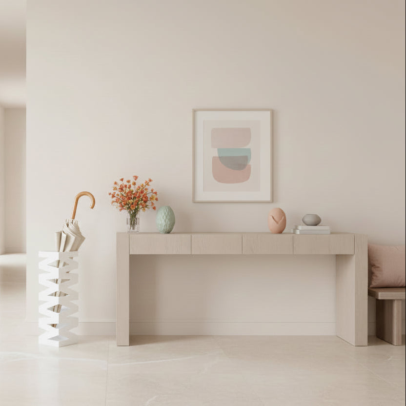 White geometric wall art with interlocking shapes on a white background