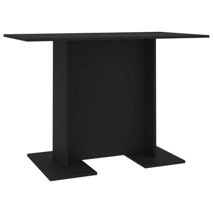 Black metal table base on a white background