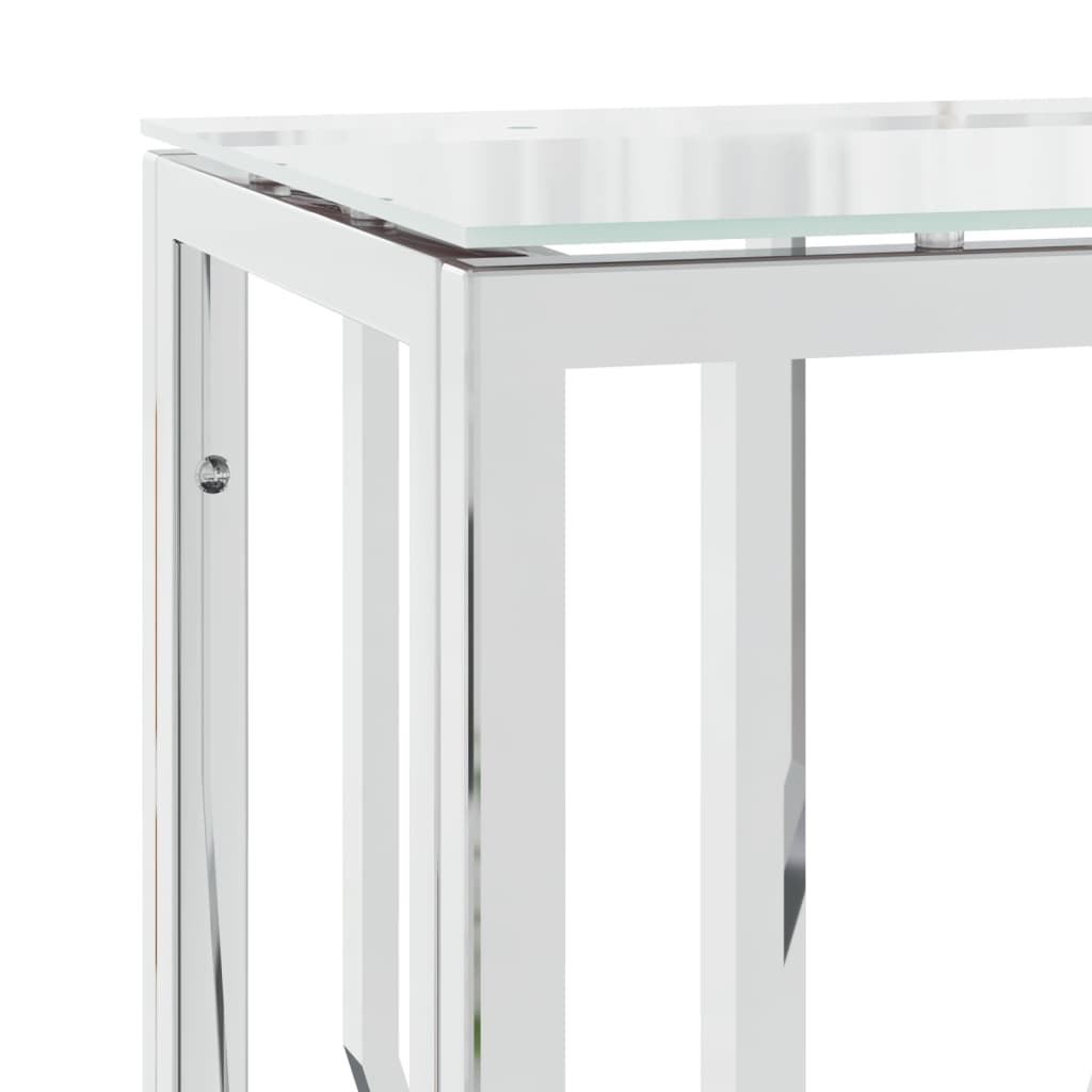 Glass side table with metal frame on a white background