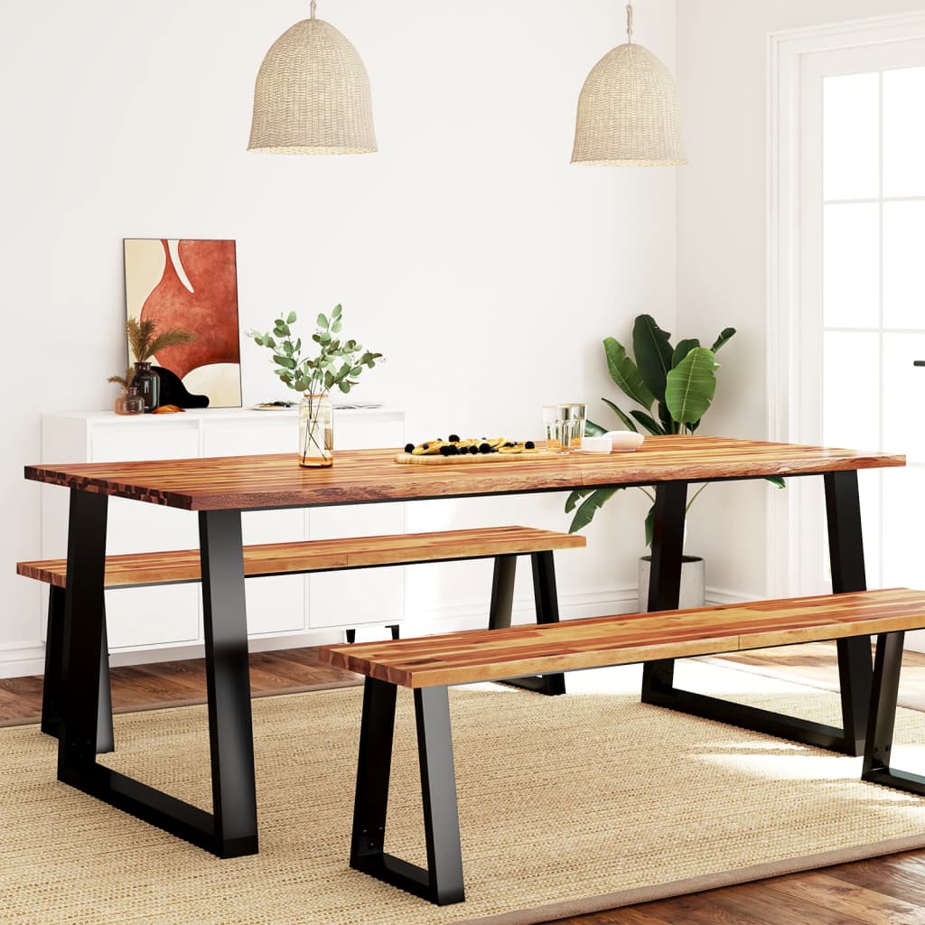 Dining table with benches in a modern living room setting
