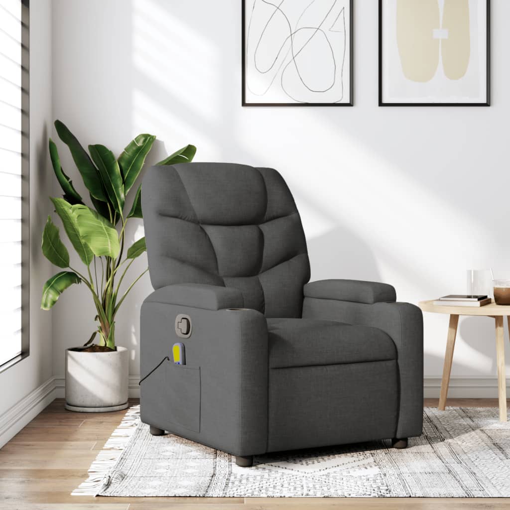 Gray recliner chair in a living room setting with a plant and table.