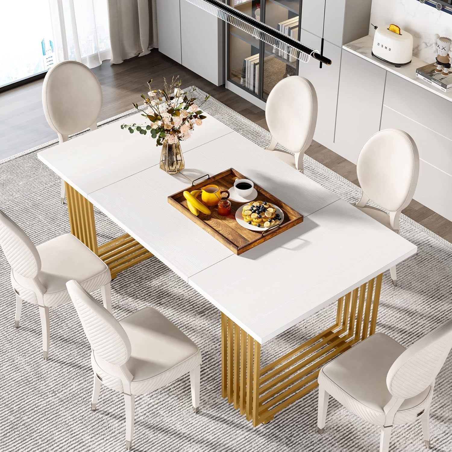 Dining table with chairs in a modern kitchen setting