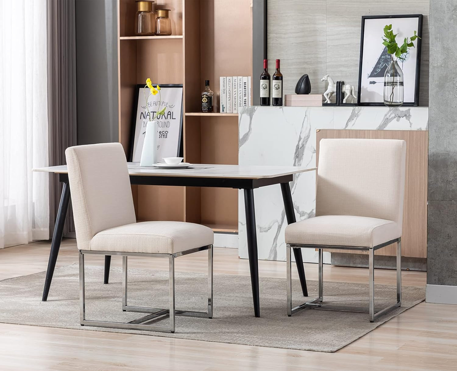 Dining table with two chairs in a modern room setting