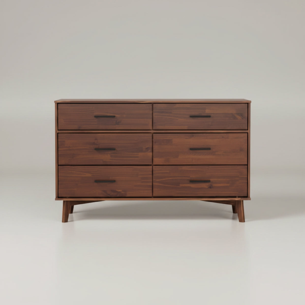 Wooden dresser with six drawers on a white background